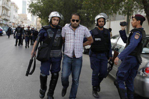 Photo of Ali Haji being arrested during his participation in a previous protest